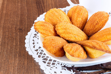 Homemade vanilla cookies Madeleine with a cup of tea 