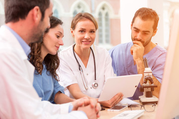 Fototapeta premium Medical team working at the hospital all together