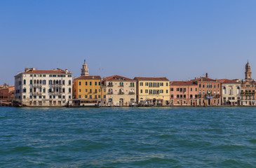 View of the embankment of the Giudecca canal in Venice, summer day