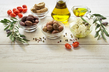 Olives, olive oil, feta cheese.