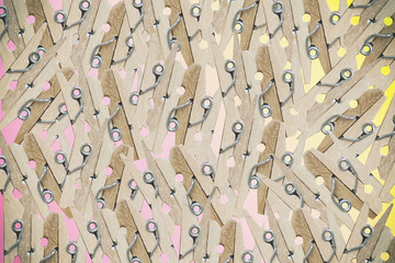 many small pegs on a pink background