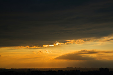 Sunset over the city. The sleeping area park view from above.