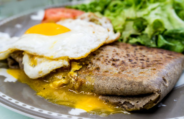Homemade french buckwheat galette with egg