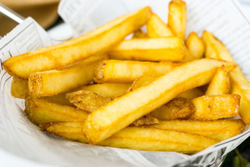 Golden French fries potatoes ready to be eaten