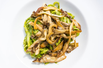 Pasta with pesto sauce and nuts on a the table