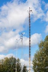 Devices of meteorological station, wind meter, on the blue sky b