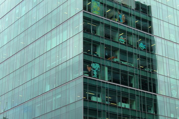 post it notes on glass front of building