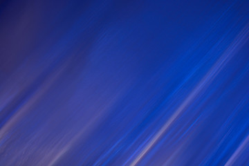 Fototapeta premium De-focused abstract light blue navy sea ocean water wavy backgro