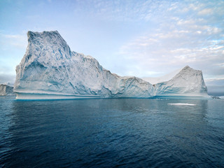 Fototapeta na wymiar Beautiful icebergs are on arctic ocean in icefjord