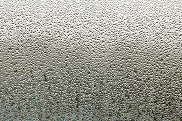 Condensation mirror, Water drops from home condensation on a window.