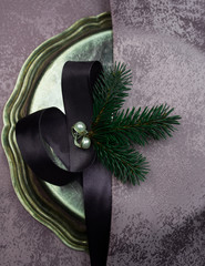 christmas, new year. silver plate, silk, fir branch, pearl. top view