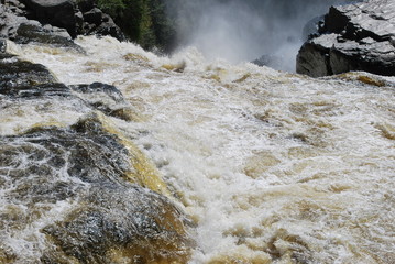 An impressive canyon carved into the bedrock by the powerful  Falls