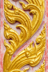 Traditional Thai style pattern on cement wall