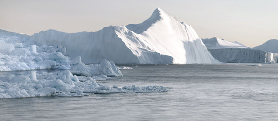 Huge icebergs are on the arctic ocean in Greenland