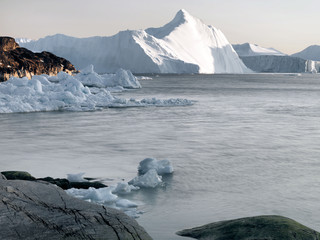 Huge icebergs are on the arctic ocean in Greenland