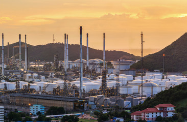 Fototapeta na wymiar Soft focus of oil refinery plant in Thailand with sunset,Bokeh lighting