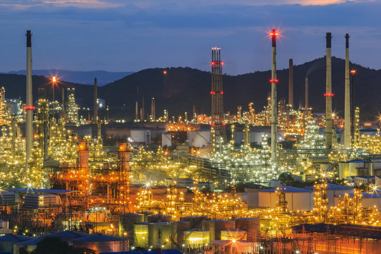 Soft focus of oil refinery plant in Thailand with sunset,Bokeh lighting