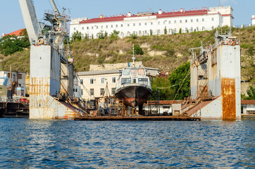 Ship being repaired in dry dock