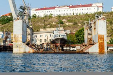 Ship being repaired in dry dock