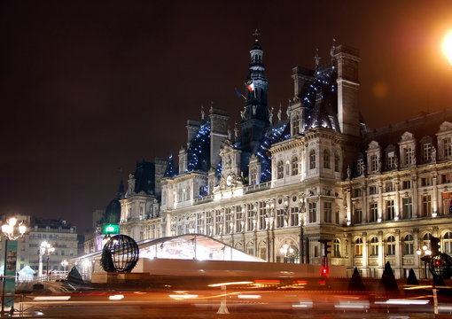 Hotel-de-Ville (City Hall) in Paris at night - building housing City of Paris's administration. Building was constructed between 1874 -1882, architects Theodore Ballou and Edouard Deperta. France