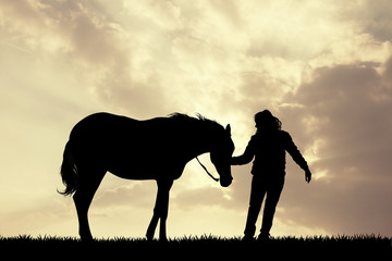 Fototapeta na wymiar girl with horse silhouette at sunset