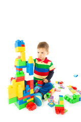 baby plays with blocks