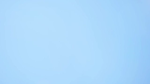 Successful team: many hands holding together on sky background in slowmotion. 1920x1080