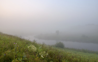 Fototapeta na wymiar Misty summer landscape.River Upa in Tula region,Russia.