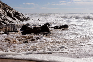 Waves on the beach Areia Branca. Lourinha, west coast of Portugal