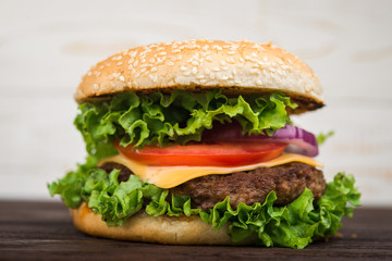 burgers on wooden table