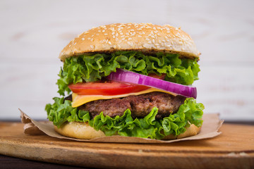 burgers on wooden table
