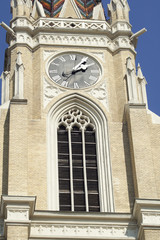 Fototapeta na wymiar Clock on Catholic church
