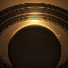 Fototapeta premium planet saturn with rings at sunrise on the space background 