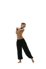 Full length photo of topless girl in wide trousers