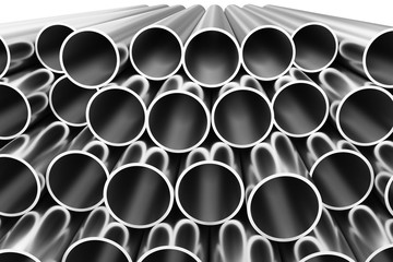 Shiny steel pipes in rows