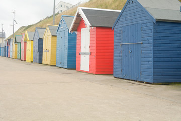 Fototapeta na wymiar The famous painted beach huts in Sheringham, Norfolk, England