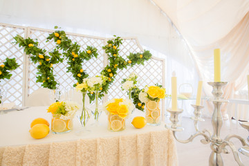White corner in the wedding pavilion decorated with lemons put i