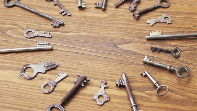 Vintage keys lie in the circle shape as a background