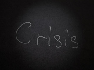 Handwritten word "Crisis"
