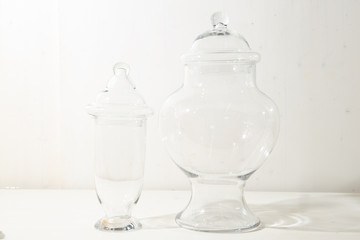 Transparent glass bowls on the white background