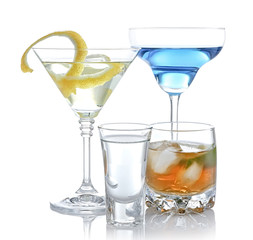 Different drinks on white background