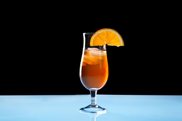 Tasty long drink on light table