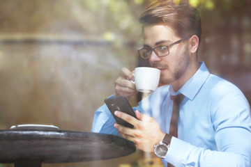 Handsome young lawyer  working in cafe