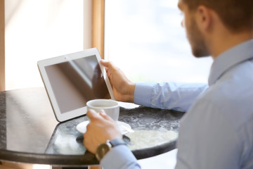 Handsome young lawyer  working in cafe