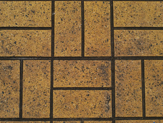 old and stained rectangle brown brick tiles