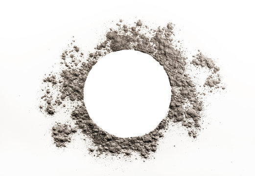 Circle drawing in grey dust, ash cloud