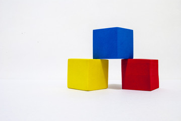 Obraz premium Cubes/ Baby colorful cubes and other shapes on a white background