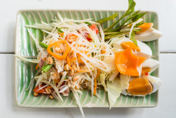 Papaya salad or Som tum, Thai food on table