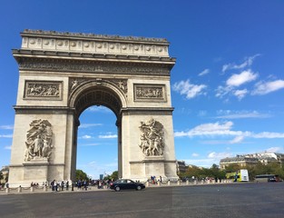 Fototapeta na wymiar Paris, France - August 28th : street view of the Triumphal Arch at the top of the Champs Elysées street 