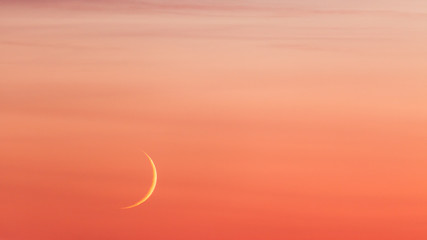 Moon crescent and pastel colors sunset sky